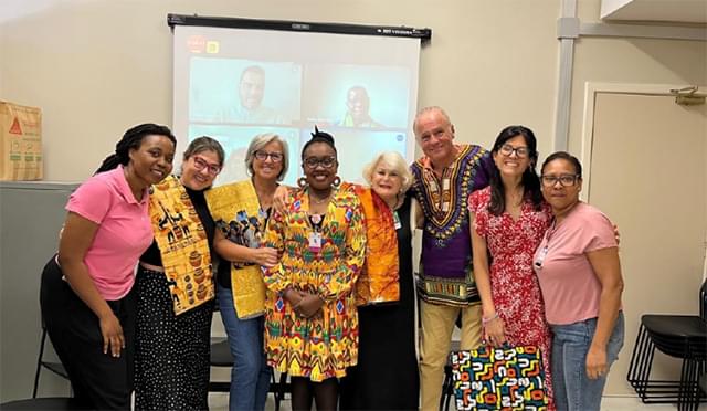 Dr. Carmen Rungo (fourth from left) and colleagues