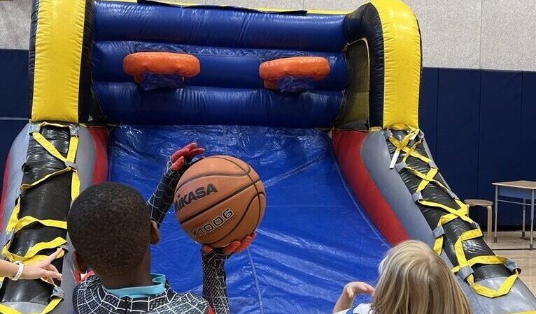 Kids playing basketball at the ADHD Summer Program