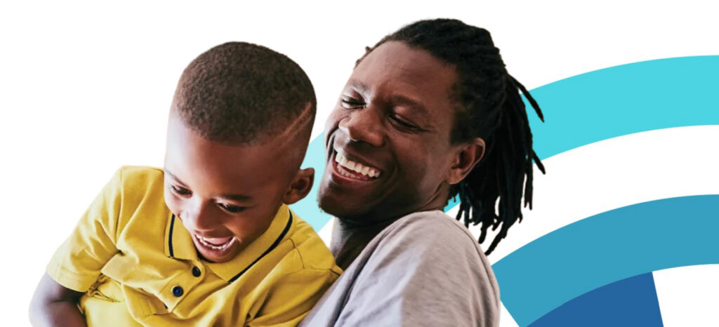 Give Monthly - Father and child smiling